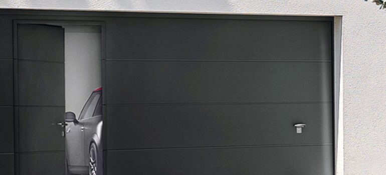 Prix porte de garage sectionnelle avec portillon