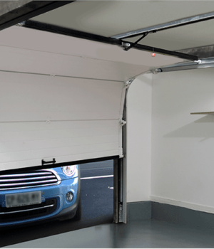 démontage des portes sectionnelles Réparation porte de garage Rhône